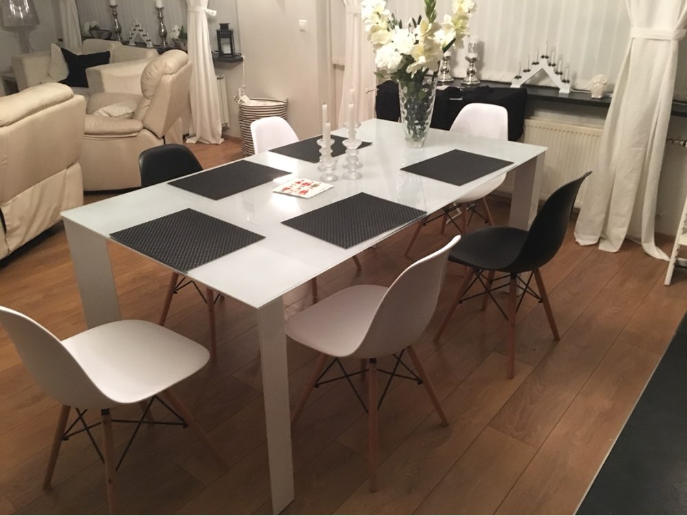 XiaoSen furniture.The modern popular plastic chair. Leisure dining chair. Composition of synthetic resin and solid wood legs.